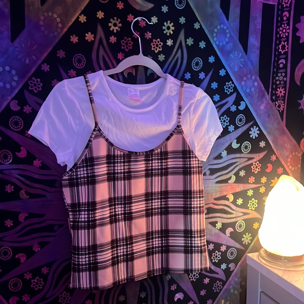 white baby tee paired with pink flanneled tank top